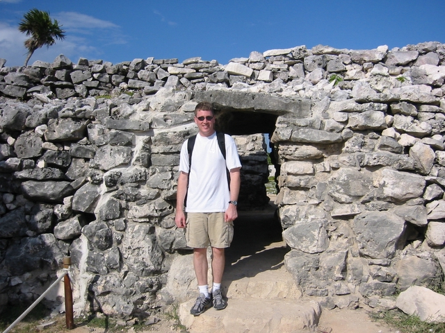 Scott climbing through the ruins